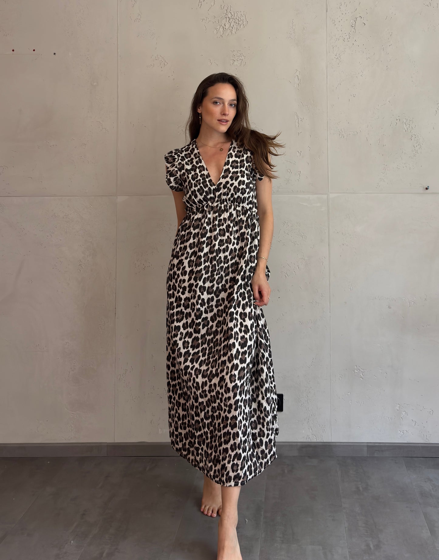 Mari Carmen | Vestido largo de leopardo con escote en la espalda