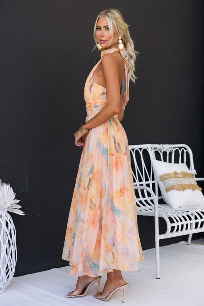 Luchi™ | Vestido maxi floral con escote halter